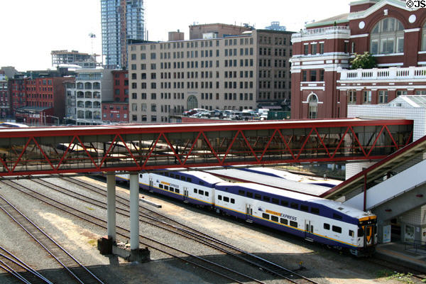 Westcoast Express commuter trains against Gastown. Vancouver, BC.