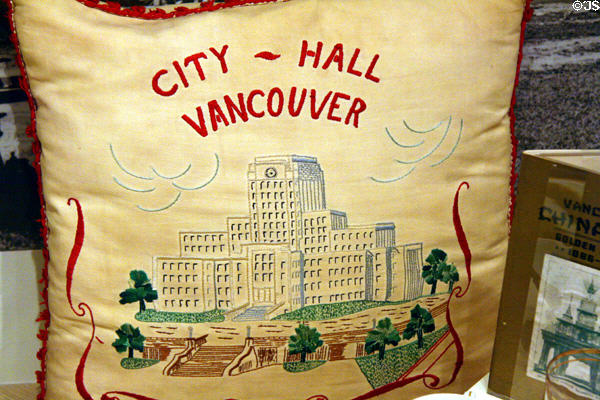 Pillow embroidered with Vancouver City Hall at Vancouver Museum. Vancouver, BC.