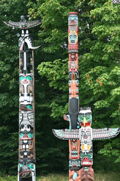 Painted Northwest coast native totem poles in Stanley Park. Vancouver, BC.