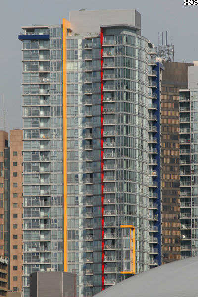 Yellow, red & blue striped residential tower beside General Motors Place. Vancouver, BC.