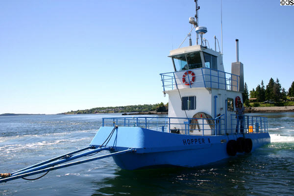 Pusher boat attached to Campobello Island ferry swings to power travel in either direction. NB.