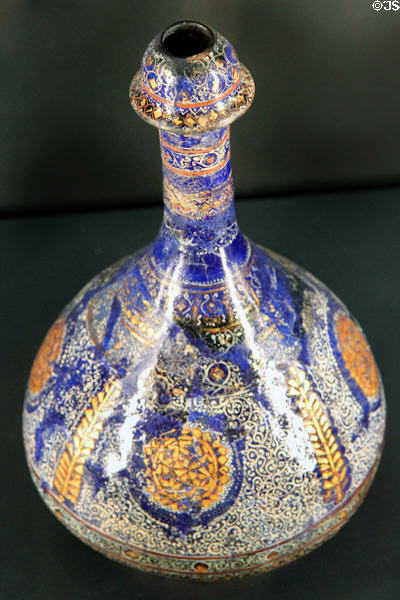 Fritware decanter with overglaze slip-painting (late 13thC) from Iran at Aga Khan Museum. Toronto, ON.