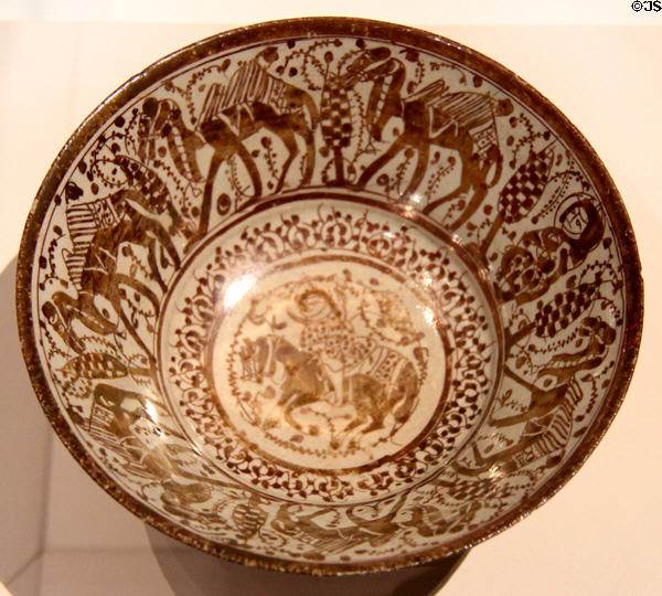Luster Fritware bowl painted with camel train (early 13thC) from Iran at Aga Khan Museum. Toronto, ON.