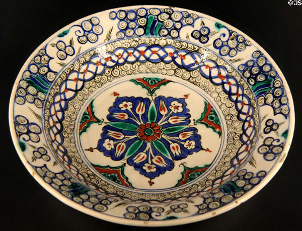 Fritware dish painted with flowers (17thC) from Iznik, Turkey at Aga Khan Museum. Toronto, ON.