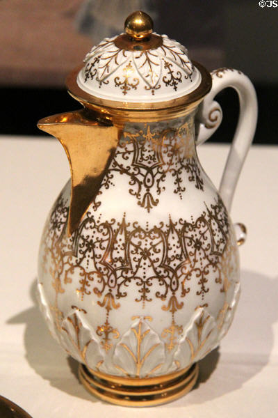 Meissen porcelain coffee pot with gold leaf (the only early porcelain color) (c1715-20) by Bartholomaus Seuter at Gardiner Museum. Toronto, ON.