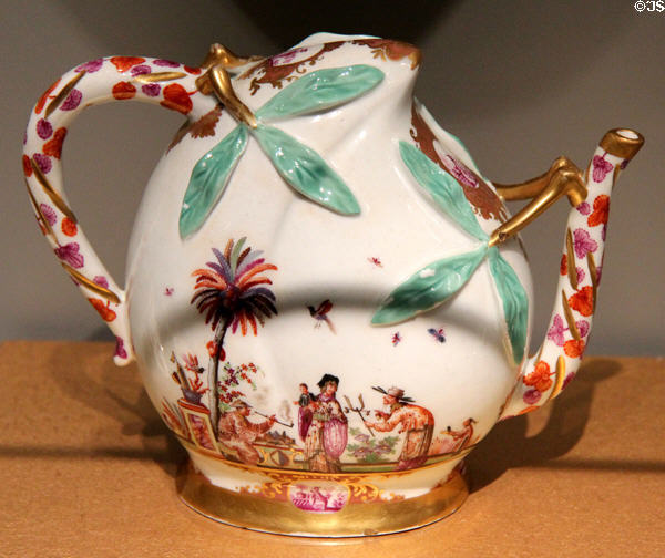 Meissen porcelain peach-shaped wine pot with applied leaves & imaginary painted Chinese scene (c1725) at Gardiner Museum. Toronto, ON.