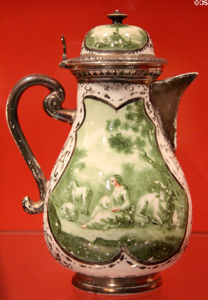 Meissen porcelain coffee pot (c1725) later decorated & hallmarked in Augsburg (c1740) by Auffenwerth silver workshop with overglaze Germanic scene in unusual green at Gardiner Museum. Toronto, ON.