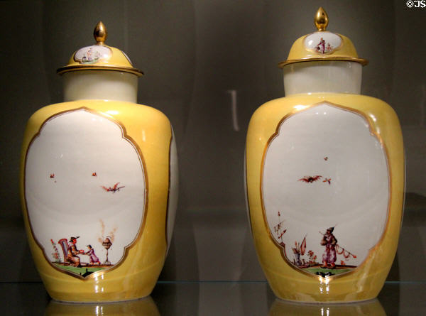Meissen porcelain covered vases decorated in yellow with imaginary Chinese scenes in white quatrefoils (c1730) at Gardiner Museum. Toronto, ON.
