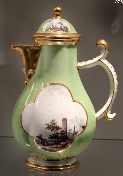 Meissen porcelain coffee pot decorated in green with European scenes in white quatrefoils (c1740) at Gardiner Museum. Toronto, ON.