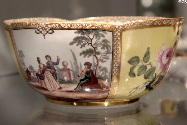 Meissen porcelain bowl from tea service (c1750-55) decorated with scene inspired by Antoine Watteau in white rectangle at Gardiner Museum. Toronto, ON.