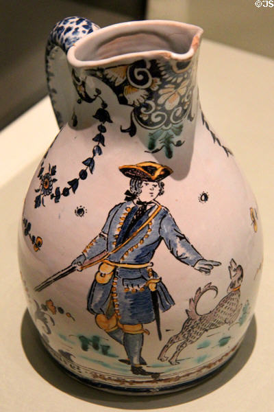 Earthenware jug with portrait of M. Tourer with hunting gun & dog (1737) made by Moulins of France at Gardiner Museum. Toronto, ON.