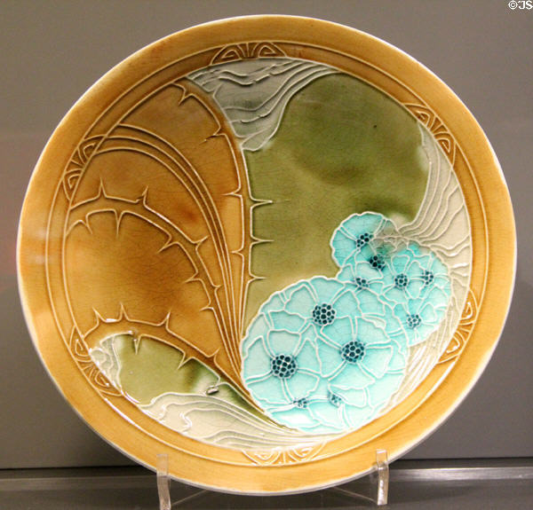 Earthenware plate in Secessionist style (1902) by Minton of Stoke-on-Trent, England at Gardiner Museum. Toronto, ON.