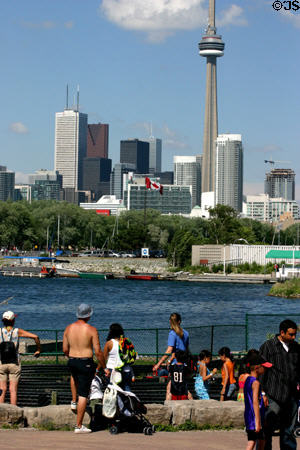 Skyline of Toronto from Ontario with people in foreground. Toronto, ON.