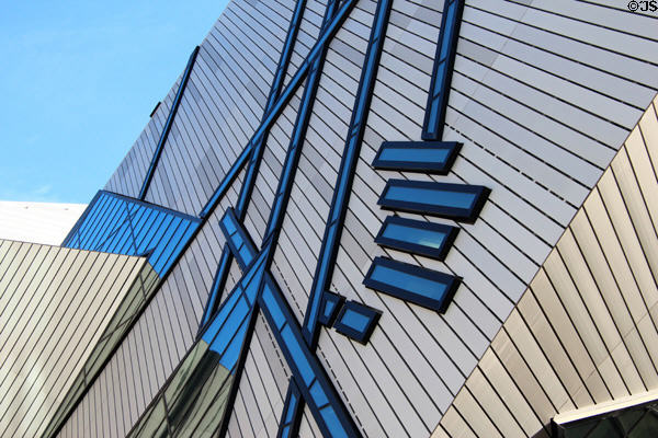 Detail of brushed, aluminum-cladding strips & glass of Chin Crystal addition to Royal Ontario Museum. Toronto, ON.