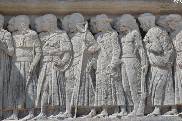 Carving of parade of cultures represented at Royal Ontario Museum. Toronto, ON.