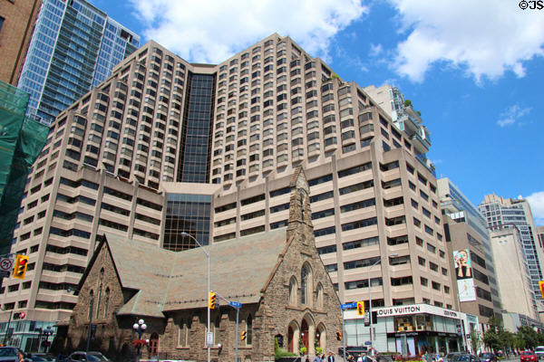 Buildings on corner Bloor at Avenue opposite Royal Ontario Museum. Toronto, ON.