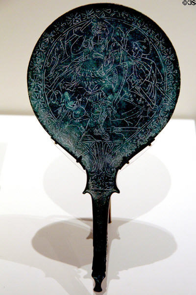 Italic bronze mirror back (c325-300 BCE) depicting two military figure in combat at Royal Ontario Museum. Toronto, ON.