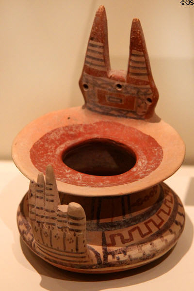 Earthenware jar with attached hand & horns (Daunian ware) (c450-375 BCE) from Canosa region at Royal Ontario Museum. Toronto, ON.