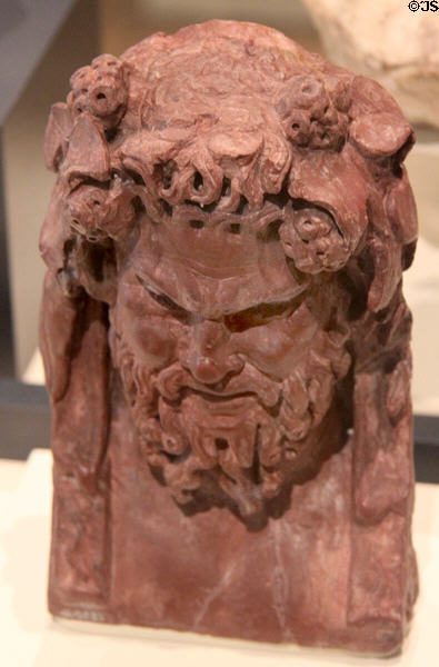 Herm of Silenus (138-192 CE) in red stone from Antonine at Royal Ontario Museum. Toronto, ON.