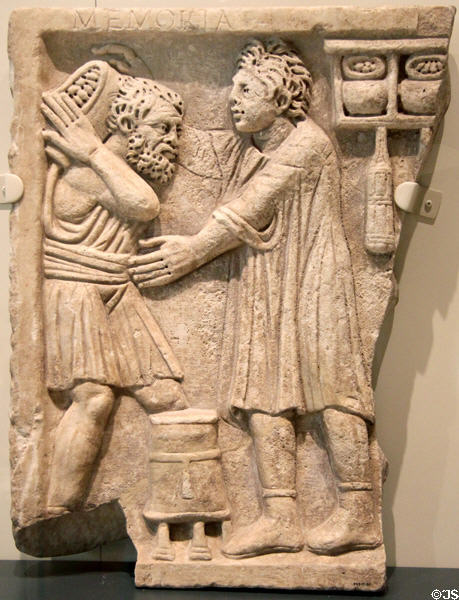 Roman marble tomb relief showing shop activity (200-300 CE) at Royal Ontario Museum. Toronto, ON.