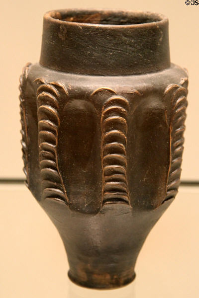 Roman fluted beaker with barbotine scale decoration (275-325 CE) from Castor, England at Royal Ontario Museum. Toronto, ON.