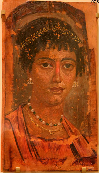 Mummy portrait of woman with jewelry from Roman Egypt (c100 CE) at Royal Ontario Museum. Toronto, ON.