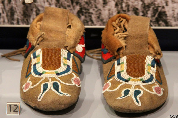 Alberta Blackfoot moccasins with curvilinear & floral design (c1890) at Royal Ontario Museum. Toronto, ON.