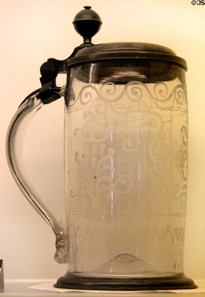 Engraved glass tankard with metal lid (c1750) from Germany (perhaps Silesia) at Royal Ontario Museum. Toronto, ON.