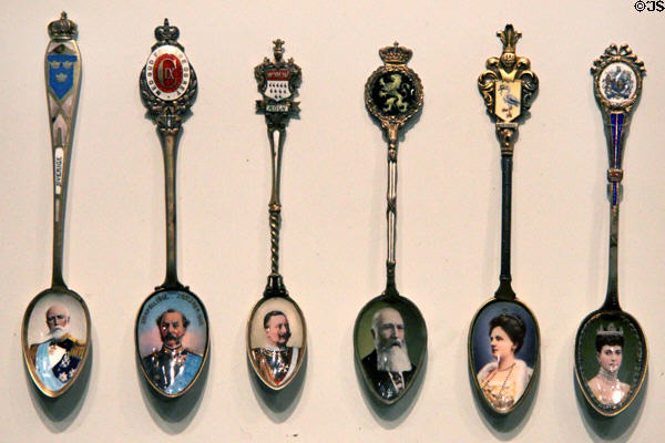Collection of souvenir spoons (prior to 1913) with photo portraits & crests of several crowned heads of Europe at Royal Ontario Museum. Toronto, ON.
