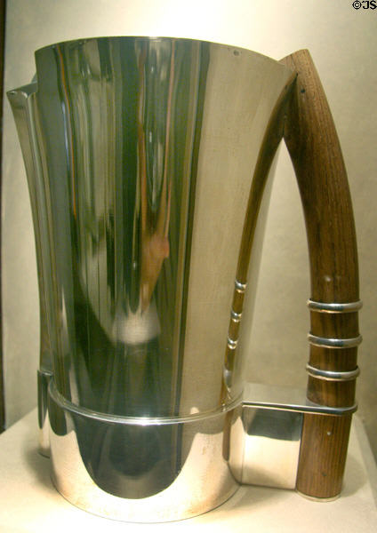 Silver & rosewood Art Deco pitcher (c1930) by workshop of Jean Puiforcat of Paris at Royal Ontario Museum. Toronto, ON.