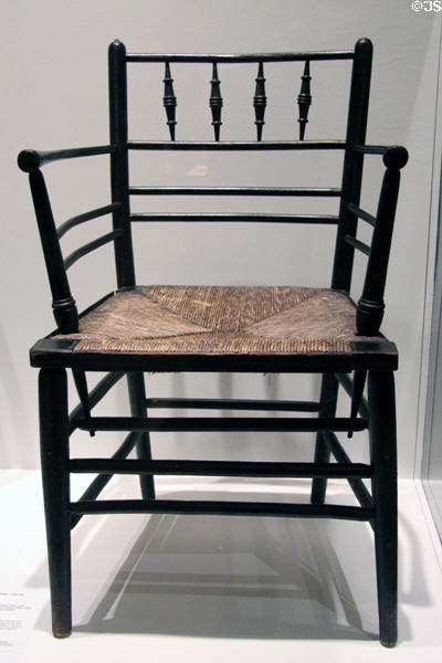 Caned armchair (late 1800s) by William Morris of England, founder of Arts & Crafts Movement, at Royal Ontario Museum. Toronto, ON.