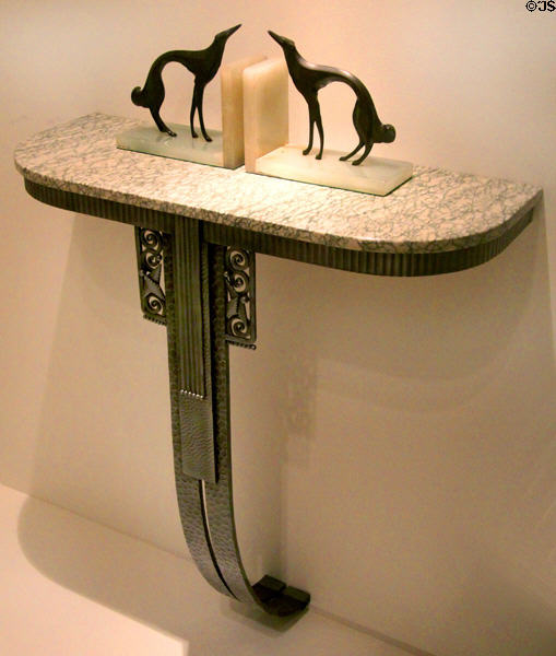 Art Deco console table in marble & wrought iron (1920s) from France & bronze & onyx bookends with greyhounds (1920s) from Grigio, Italy at Royal Ontario Museum. Toronto, ON.