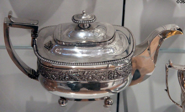 Silver tea pot (c1820) for retailer James Smillie of Quebec City imported from England at Royal Ontario Museum. Toronto, ON.