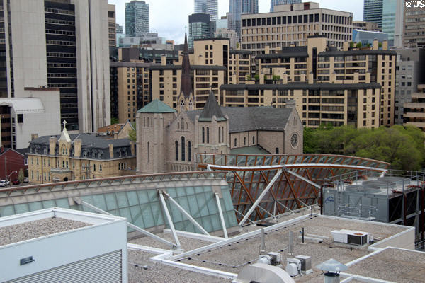 Gehry's Art Gallery of Ontario facade wends way through Toronto skyline. Toronto, ON.