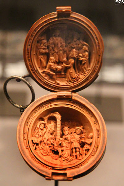 Carved boxwood prayer bead (c1520) with Queen of Sheba visiting King Solomon above & Adoration of Magi below from Duchy of Brabant at Art Gallery of Ontario. Toronto, ON.