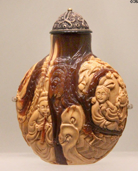 Japanese snuff bottle with figures in mixed brown colors at Art Gallery of Ontario. Toronto, ON.