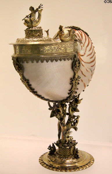 Nautilus shell cup in gilded silver mount in form of tree stem with figures of Neptune, child & animals (late 17thC) from Northern German (?) at Art Gallery of Ontario. Toronto, ON.