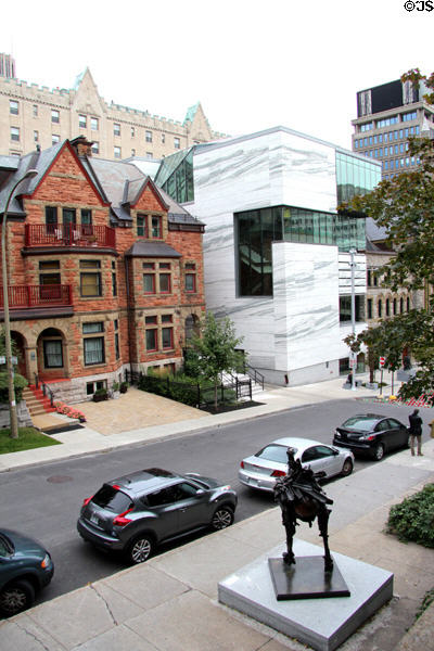 Streetscape with heritage building & white addition to Montreal Museum of Fine Arts. Montreal, QC.