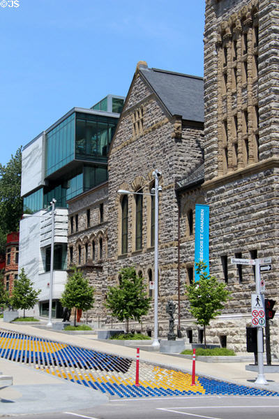 Street on Montreal Museum of Fine Arts campus with artistic arrangement of road markers. Montreal, QC.