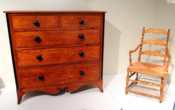 Butternut, pine, maple chest of drawers (1848) plus birch & straw armchair (18thC) from Quebec at Montreal Museum of Fine Arts. Montreal, QC.