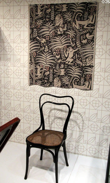 Jungle fabric (1910-1) by Ludwig Heinrich Jungnickel of Austria over Cafémuseum chair (1899) by Adolf Loos for Thonet Brothers at Montreal Museum of Fine Arts. Montreal, QC.