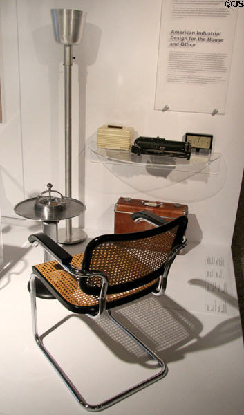 Cesca armchair (1928, example c1975) by Marcel Breuer with floor lamp (1920-20) by Russel Wright & smoking stand (c1938) by Henry Dreyfuss at Montreal Museum of Fine Arts. Montreal, QC.