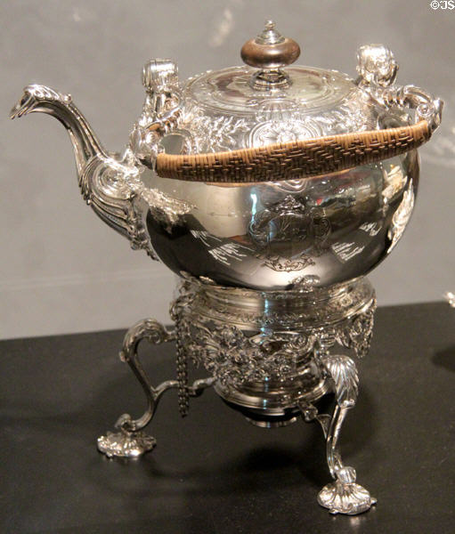 Silver tea kettle on stand (1746-7) by Robert Tyrill of London at Montreal Museum of Fine Arts. Montreal, QC.