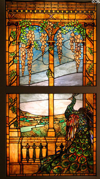 Peacock stained glass window (c1900-10) by Louis Comfort Tiffany Studios at Montreal Museum of Fine Arts. Montreal, QC.