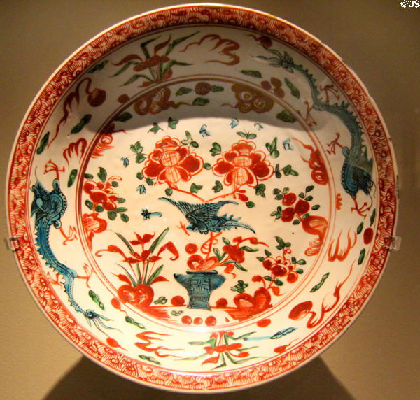 Porcelain Swatow ware dish painted with blue dragons & red flowers (c1600 Ming dynasty) from China at Montreal Museum of Fine Arts. Montreal, QC.