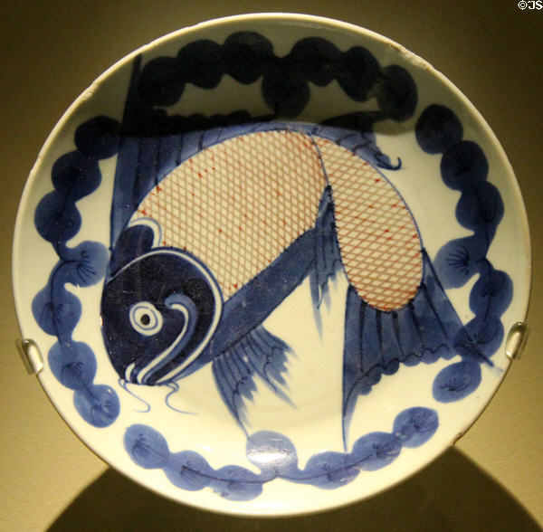 Porcellaneous stoneware Min yao plate painted with blue fish (mid 19thC Qing dynasty) from China at Montreal Museum of Fine Arts. Montreal, QC.