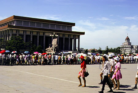 Crowds line up to enter Mao's Mausoleum in Beijing. China.