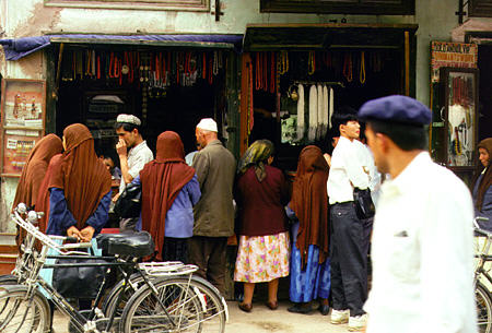 Shopping in street markets near a mosque in Kashgar. China.