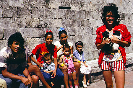 Cuban girls with puppies in Havana. Cuba.