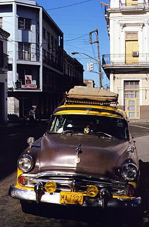 Old car parked on streets of Mantanzas. Cuba.
